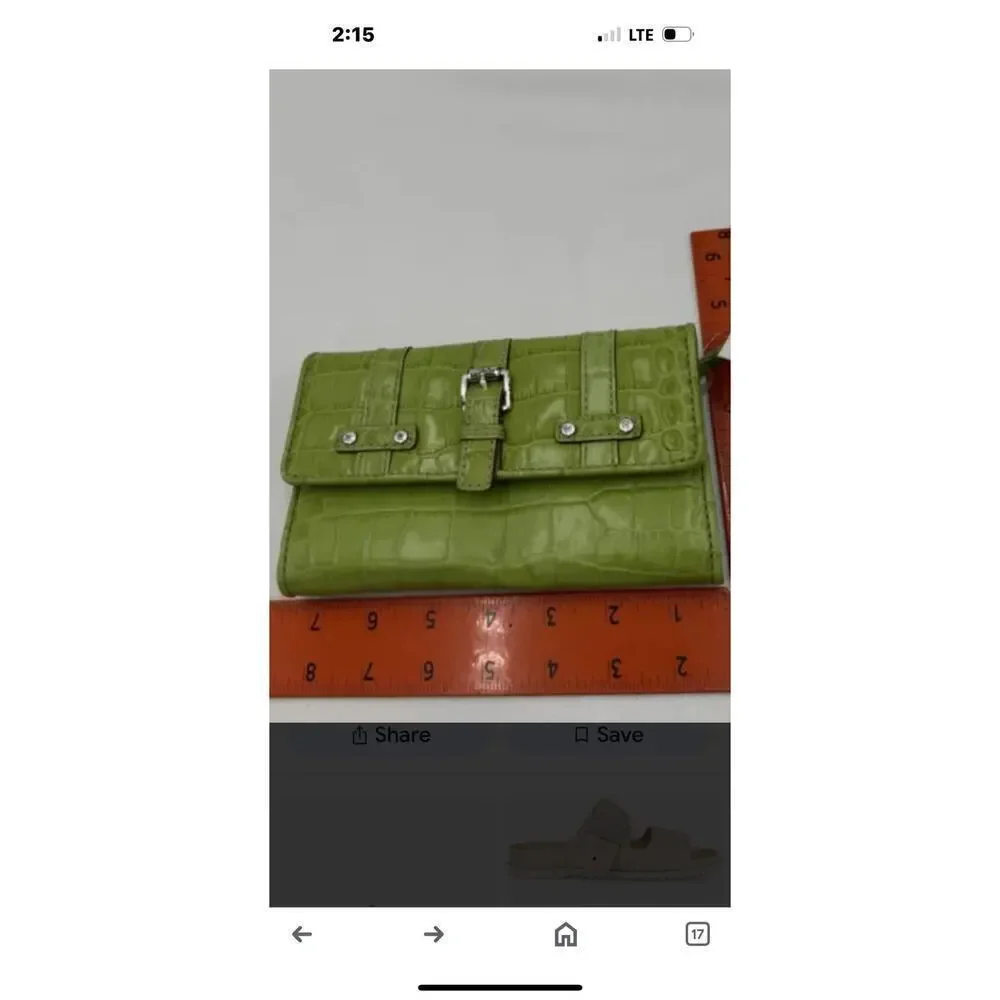 Michael Kors “Natasha” croc embossed leather wallet.